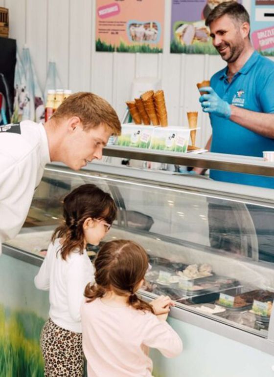 Family choosing ice cream at Bluebell's