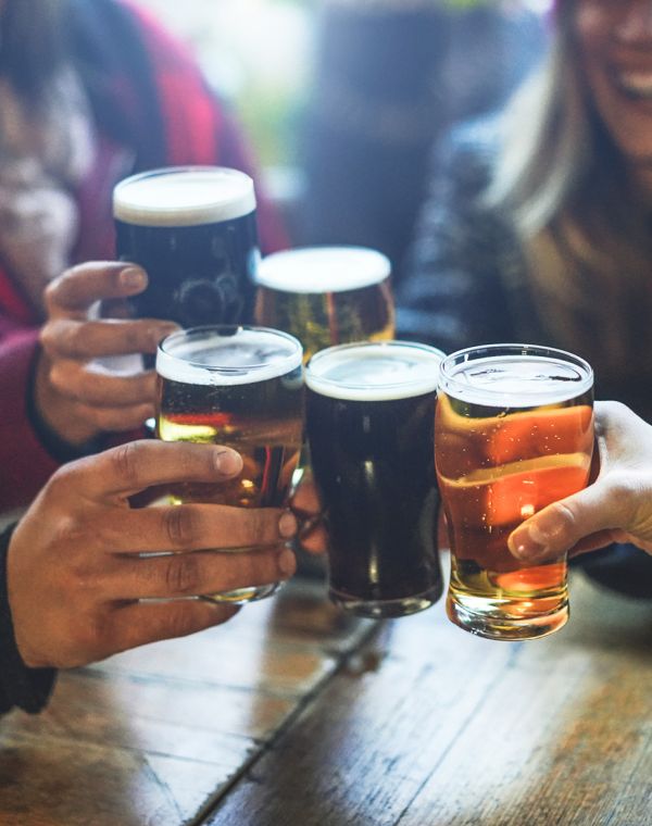 Clinking pints of beer