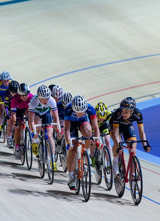 A group of cyclists in Derby velodrome